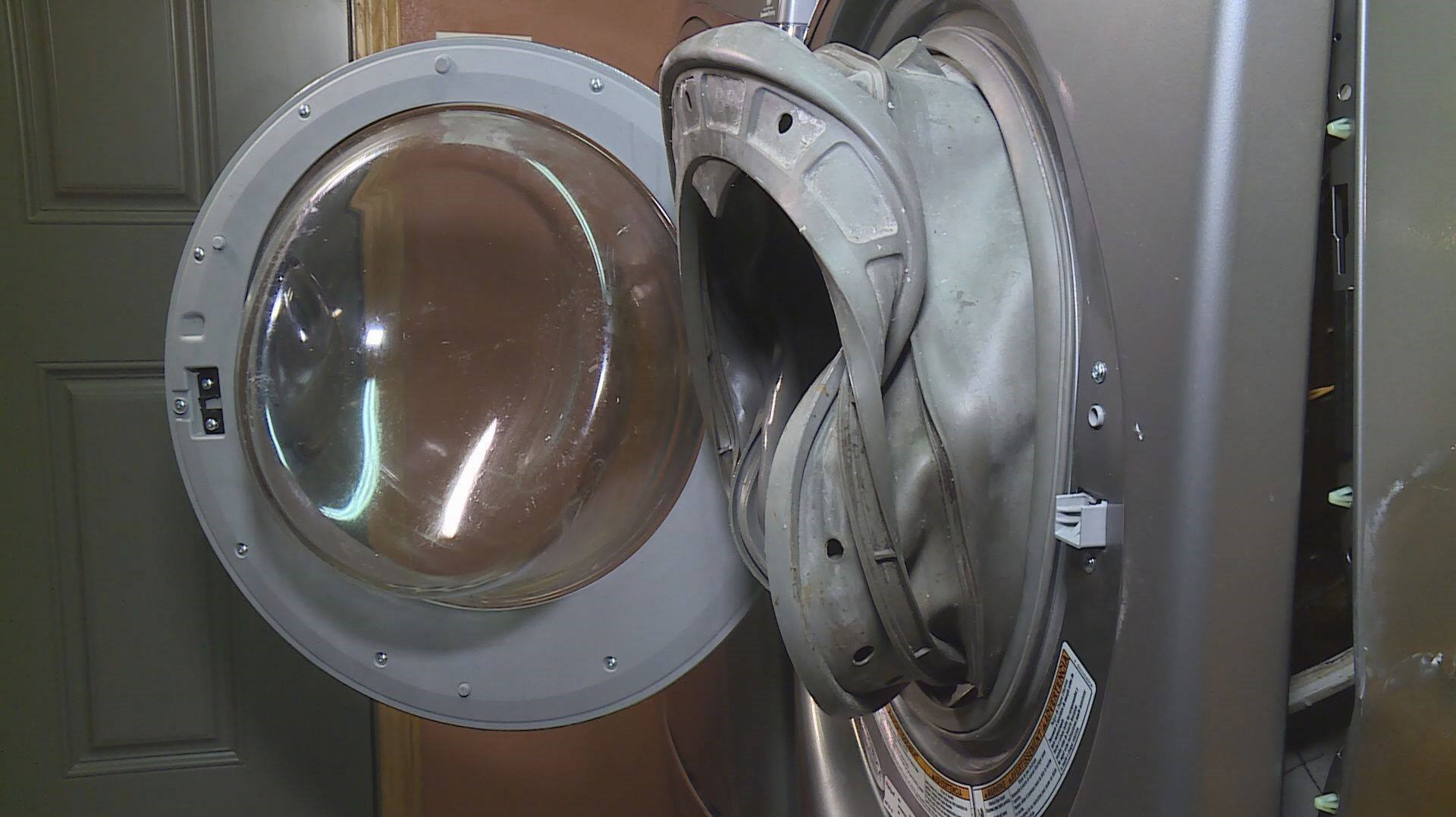 Exploding washing machine knocks out mother